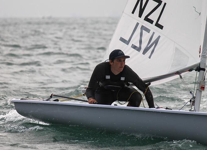 New Zealand’s Thomas Saunders is in contention in the Laser after day one © ISAF 
